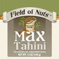Field of Nuts Max Tahini packaging with sesame seeds and green background